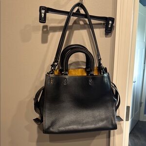 Black and Gold Coach Pebble Leather Rogue Handbag